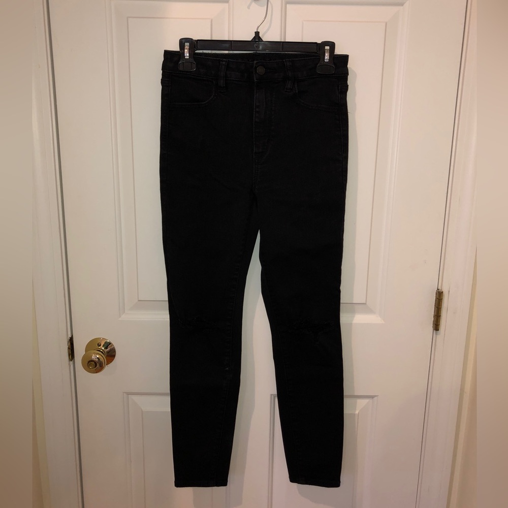American Eagle Ne(X)t Level Stretch black jeans w/frayed knees